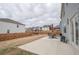Large backyard with a patio, wooden fence and covered seating area at 2718 Serena Way, Atlanta, GA 30331