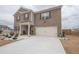 Traditional two-story brick home with a two-car garage and well-maintained landscaping at 2718 Serena Way, Atlanta, GA 30331