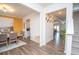 Bright foyer with hardwood floors leads to a dining room and the stairway to the second floor at 2718 Serena Way, Atlanta, GA 30331