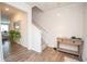 Light and airy foyer with wood floors features a staircase and decorative accents at 2718 Serena Way, Atlanta, GA 30331