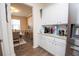 Kitchen with white cabinets, stainless steel appliances, and a granite countertop at 2718 Serena Way, Atlanta, GA 30331