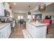 Bright kitchen with stainless steel appliances, a kitchen island, and adjacent dining area at 2718 Serena Way, Atlanta, GA 30331