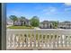 View from the balcony shows neighboring homes and green lawns at 2989 Waterford Dr, Conyers, GA 30094
