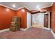 Unfinished basement shows potential for storage or future living space. The room has good lighting at 2989 Waterford Dr, Conyers, GA 30094