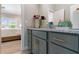 Stylish bathroom with granite counters, vanity, view into bedroom and modern fixtures at 2989 Waterford Dr, Conyers, GA 30094