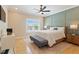 Bedroom featuring paneling, stylish ceiling fan and lighting, and natural light at 2989 Waterford Dr, Conyers, GA 30094