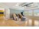 Spacious bonus room with high tray ceilings, hardwoods, and massage chairs at 2989 Waterford Dr, Conyers, GA 30094