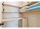 Walk-in closet with custom shelving and built-in desk at 2989 Waterford Dr, Conyers, GA 30094