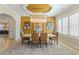 Dining room with designer lighting, modern decor, and large windows at 2989 Waterford Dr, Conyers, GA 30094