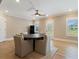 Casual dining area offers natural light, a modern ceiling fan, and easy access to outdoor space at 2989 Waterford Dr, Conyers, GA 30094