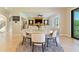 Open concept dining room flows into a living area with modern decor at 2989 Waterford Dr, Conyers, GA 30094