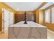 Large dressing room with center island, custom cabinetry, and natural light from the windows at 2989 Waterford Dr, Conyers, GA 30094