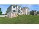 Stately two-story home with a manicured lawn and stone accents at 2989 Waterford Dr, Conyers, GA 30094