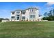 Stately exterior view of a modern home with manicured lawn, stone accents, and well-appointed landscaping at 2989 Waterford Dr, Conyers, GA 30094