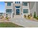 A double front door makes an elegant entrance to this stone and brick home at 2989 Waterford Dr, Conyers, GA 30094