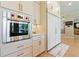 Eat-in kitchen features stainless steel Wolf appliances, and custom cabinets at 2989 Waterford Dr, Conyers, GA 30094