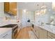 Gourmet kitchen features a large island, stainless steel appliances, and bright lighting at 2989 Waterford Dr, Conyers, GA 30094