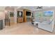 Living room featuring a modern fireplace, built-in storage and large windows at 2989 Waterford Dr, Conyers, GA 30094