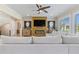 Comfortable living room with modern fireplace and a plush sofa with large windows at 2989 Waterford Dr, Conyers, GA 30094