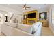 Cozy living room featuring comfortable seating, a fireplace, and built-in entertainment center at 2989 Waterford Dr, Conyers, GA 30094
