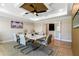 Spacious office with custom ceiling and lighting with a large table and seating at 2989 Waterford Dr, Conyers, GA 30094