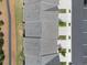 Aerial view of a home's roof with solar panels and a parking lot at 3604 Silvery Way, Powder Springs, GA 30127