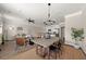 Open concept living space with a dining area, living room, and modern kitchen at 3604 Silvery Way, Powder Springs, GA 30127