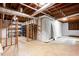 Unfinished basement with concrete floors, exposed ductwork, and potential for a customized space at 1855 Vintage Dr, Snellville, GA 30078