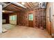 Unfinished basement featuring exposed ductwork, framing, and doors, awaiting renovation for a customized space at 1855 Vintage Dr, Snellville, GA 30078