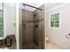 Modern bathroom with walk-in shower and tile floors at 1855 Vintage Dr, Snellville, GA 30078