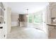 Eat in kitchen with large bay window, access to stairs and backyard at 1855 Vintage Dr, Snellville, GA 30078