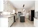 Spacious kitchen with stainless steel appliances, center island, and tile backsplash at 1855 Vintage Dr, Snellville, GA 30078