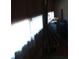 A garage or shed corner with items leaning and stacked along the wall at 2795 Dodson Lee Dr, East Point, GA 30344