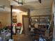 A cluttered garage with block walls, shelving, and various household items at 2795 Dodson Lee Dr, East Point, GA 30344