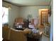 Bright living room showcasing traditional decor, elegant furniture, and natural light from a window at 2795 Dodson Lee Dr, East Point, GA 30344