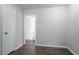 Hallway area with new flooring and neutral paint at 3938 Emerald Springs Ct, Decatur, GA 30035