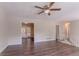 Open living room floor plan with new flooring and neutral paint at 3938 Emerald Springs Ct, Decatur, GA 30035