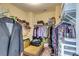Spacious walk-in closet with ample storage, shelving, and hanging space for clothes and accessories at 609 Turnbill Dr, Mcdonough, GA 30252