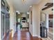 Bright foyer with hardwood floors, an open archway, and a view to the living room at 609 Turnbill Dr, Mcdonough, GA 30252
