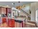 Open kitchen with center island and breakfast bar overlooking the living area at 609 Turnbill Dr, Mcdonough, GA 30252