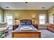 Inviting main bedroom with neutral tones, carpet and a full-size bed at 609 Turnbill Dr, Mcdonough, GA 30252