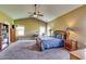 Spacious primary bedroom with vaulted ceilings and natural light at 609 Turnbill Dr, Mcdonough, GA 30252