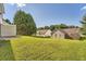 A wide shot of the backyard with a storage shed at 982 Hunt Rd, Jonesboro, GA 30236