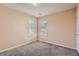 Cozy bedroom features neutral walls, carpet flooring, and bright natural light from two windows at 982 Hunt Rd, Jonesboro, GA 30236