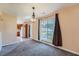 Open-concept dining area with natural light and view into the kitchen at 982 Hunt Rd, Jonesboro, GA 30236