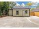 Exterior featuring a light siding, dark trim and a long concrete driveway at 1055 Mayson Turner Nw Rd, Atlanta, GA 30314