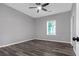 Comfortable bedroom boasting modern ceiling fan and new flooring at 1055 Mayson Turner Nw Rd, Atlanta, GA 30314