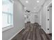 Bright hallway with stylish dark wood-look flooring and freshly painted walls at 1055 Mayson Turner Nw Rd, Atlanta, GA 30314