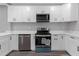 Modern kitchen featuring stainless steel appliances and quartz countertops at 1055 Mayson Turner Nw Rd, Atlanta, GA 30314