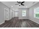 Spacious room with dark wood-look flooring and views out the windows at 1055 Mayson Turner Nw Rd, Atlanta, GA 30314